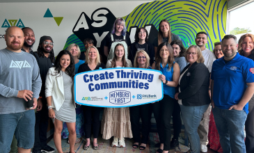 Members First Team members pose with the AYA Team